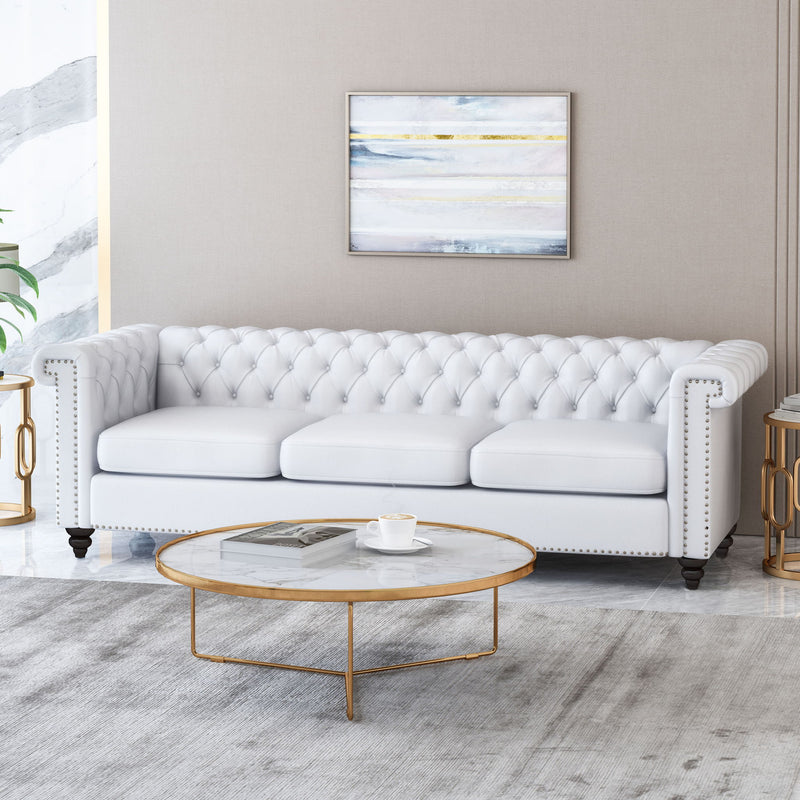 Noble House Chesterfield style 3-seater stationary sofa with deep button tufting and plush upholstery.