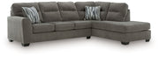 Benchcraft Olten stationary sectional sofa with plush cushions and modern design, perfect for contemporary living rooms.