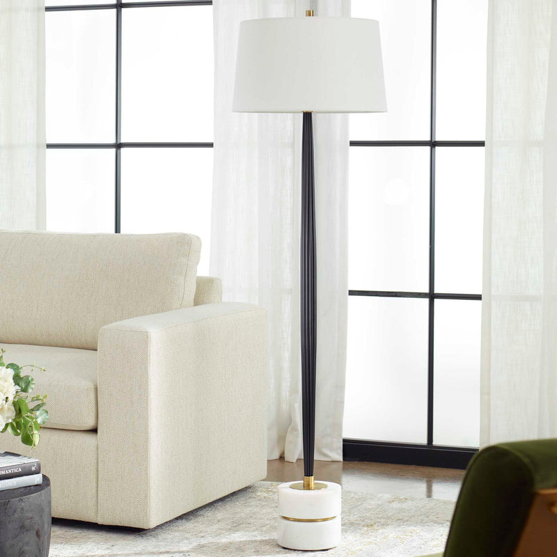 Uttermost Miraz black floor lamp with sleek modern design, featuring a slim stand and a cylindrical lampshade.