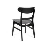 Noble House modern dining side chair with upholstered seat and wood frame, showcasing a sleek, contemporary design.
