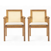 Set of two Noble House Preston outdoor teak dining chairs with beige cushions, ideal for patio or garden seating.