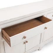 Classic Home Winford 3-drawer, 6-door buffet cabinet with wood finish and modern design for extra storage.