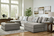 Signature Design by Ashley Avaliyah 5-piece living room set with sofa, loveseat, and armchairs arranged in a modern living space.
