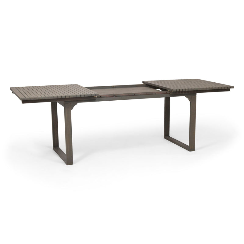 Outdoor expandable dining table in acacia wood with U-shaped legs by Noble House, perfect for outdoor gatherings and dining.