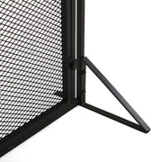 Noble House Samantha iron fireplace screen with a two-door design, decorative metalwork, and a sturdy frame for fireplace protection.