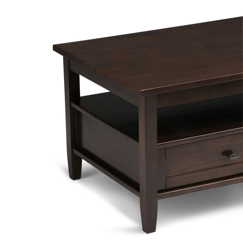 Handcrafted Warm Shaker coffee table by Simpli-Home with a smooth wooden surface and sturdy legs.