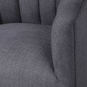 Dark gray Uttermost Cuthbert modern swivel chair with a sleek design and comfortable cushioned seat.