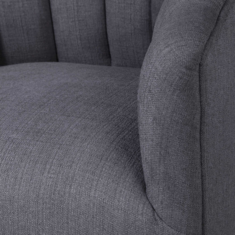 Dark gray Uttermost Cuthbert modern swivel chair with a sleek design and comfortable cushioned seat.
