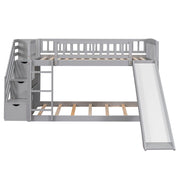 Gray DreamHaus twin over twin bunk bed with stairway, two drawers, and slide, featuring a sturdy frame and safety railings.