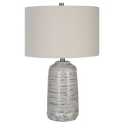 Uttermost Cyclone ivory table lamp with textured ceramic base and fabric shade, ideal for modern and contemporary decor.