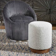 Uttermost Avila accent ottoman with plush fabric and wooden legs, versatile for living room or bedroom decor.