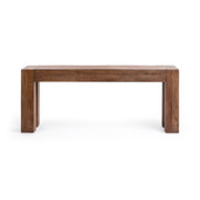 Classic Home Montera coffee table with a sleek wooden top and sturdy metal legs in a modern living room setting.