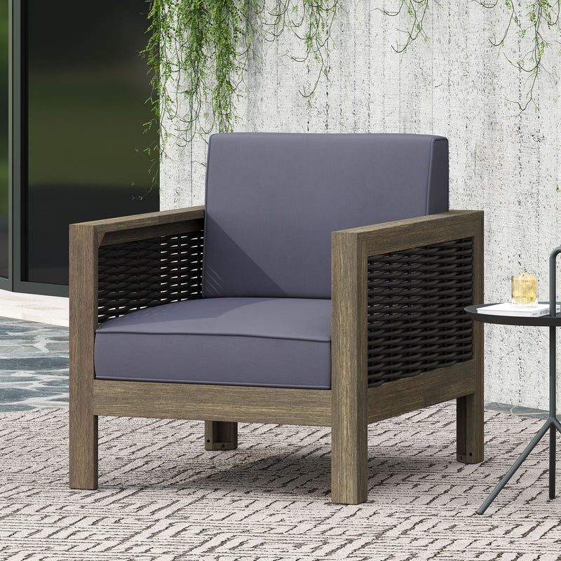 Outdoor acacia wood arm chair with wicker accents by Noble House, showcasing a sturdy frame and stylish woven details.