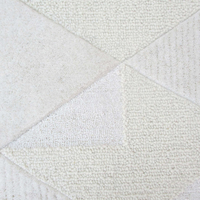 Uttermost La Veta accent rug with intricate geometric pattern in neutral tones, ideal for adding style to living spaces.