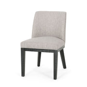 Set of two Noble House modern dining chairs with durable fabric upholstery and sturdy wooden frames, shown from a side view.