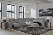 Signature Design by Ashley Modmax II reclining sectional in salt and pepper fabric, showing plush cushions and reclining seats.