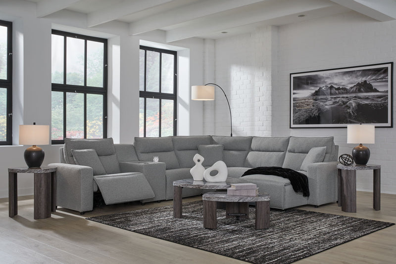 Signature Design by Ashley Modmax II reclining sectional in salt and pepper fabric, showing plush cushions and reclining seats.