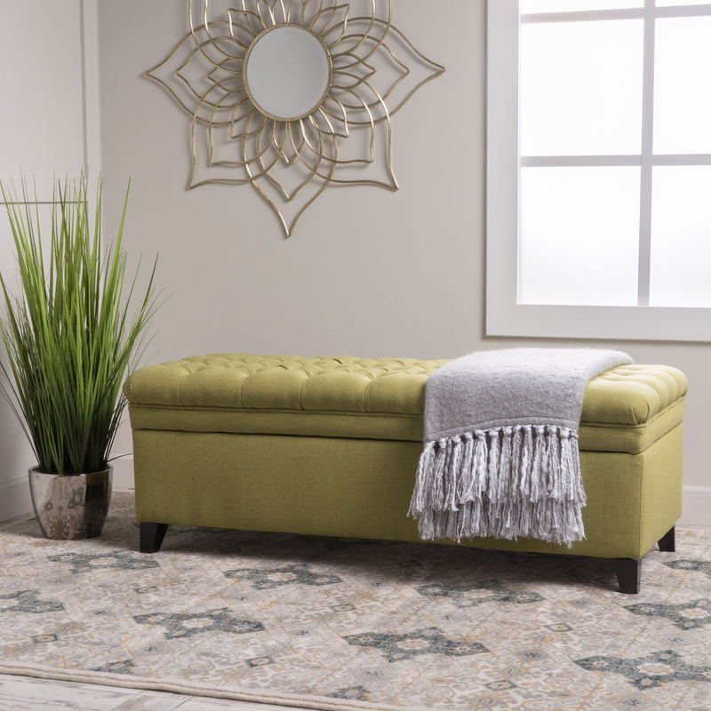 Noble House Juliana storage ottoman with beige fabric and birch wood legs, serving as a stylish and functional home accent piece.