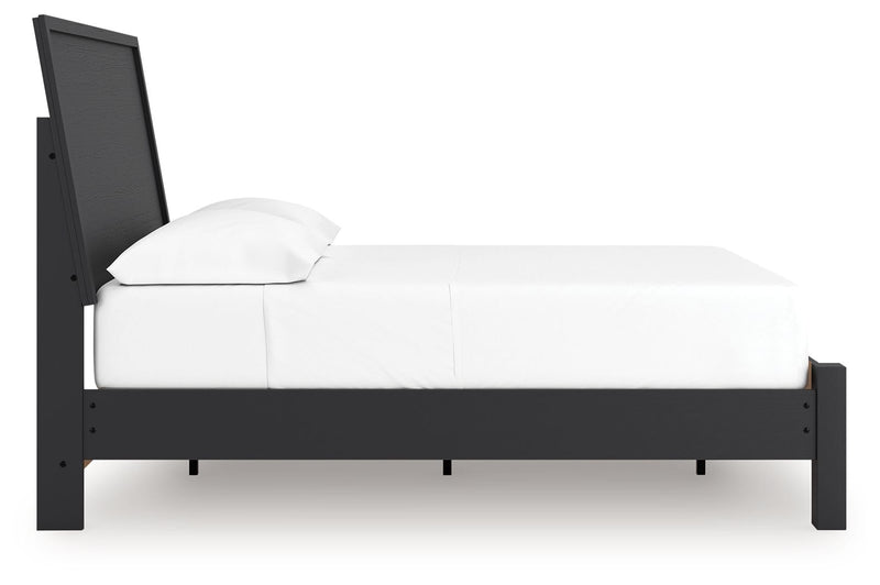 Danziar panel bed with low footboard from Signature Design by Ashley, featuring a sleek wooden frame and modern design.