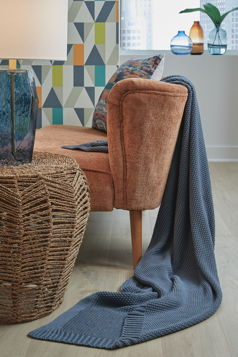 Gayelery throw blanket by Signature Design by Ashley®, soft fabric with a cozy, textured pattern in neutral tones.