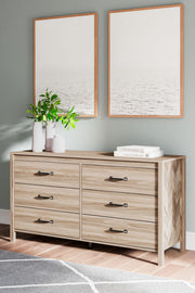 Battelle - Six Drawer Dresser - Tan - R&R Furniture Gallery (Fountain Valley, CA)