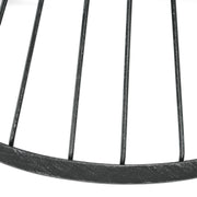 Noble House Lassen modern outdoor side table with hourglass design, featuring sleek metal frame and round tabletop for patio decor.