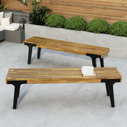 Set of two Noble House teak dining benches with smooth wooden seats and sturdy legs, ideal for kitchen or dining room decor.