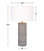 Gray Monolith table lamp by Uttermost featuring a modern, geometric design with a neutral fabric shade.