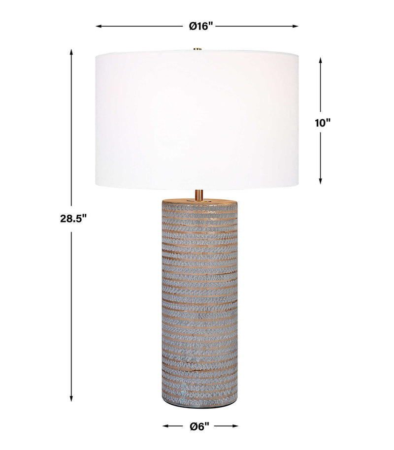 Gray Monolith table lamp by Uttermost featuring a modern, geometric design with a neutral fabric shade.