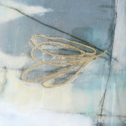 Set of two framed abstract prints by Uttermost titled Gilded Whimsy, featuring dark gray and gold accents on modern wall art.