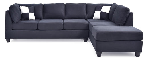 Glory Furniture Malone Comfort Sectional sofa with plush cushions and neutral fabric upholstery in a modern living room setting.