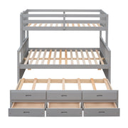 DreamHaus bunk bed with twin size trundle and built-in drawers, featuring a sturdy wooden frame and space-saving design.