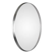 Uttermost Pursley oval wall mirror with brushed nickel finish, showcasing a sleek, contemporary design for modern interior decor.