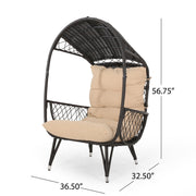 Outdoor wicker standing basket chair with cushion, Noble House accent chair for patio or garden seating.