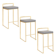 Pair of Lumi Source Fuji contemporary glam counter stools with sleek design and upholstered seats, set of two.