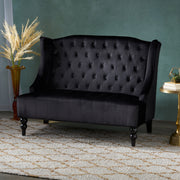 Noble House upholstered loveseat with wing back and diamond tufting, featuring plush seating and elegant design.