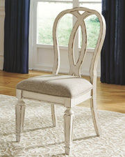 Realyn - Dining UPH Side Chair (Set of 2) - Ribbonback - Chipped White - R&R Furniture Gallery (Fountain Valley, CA)