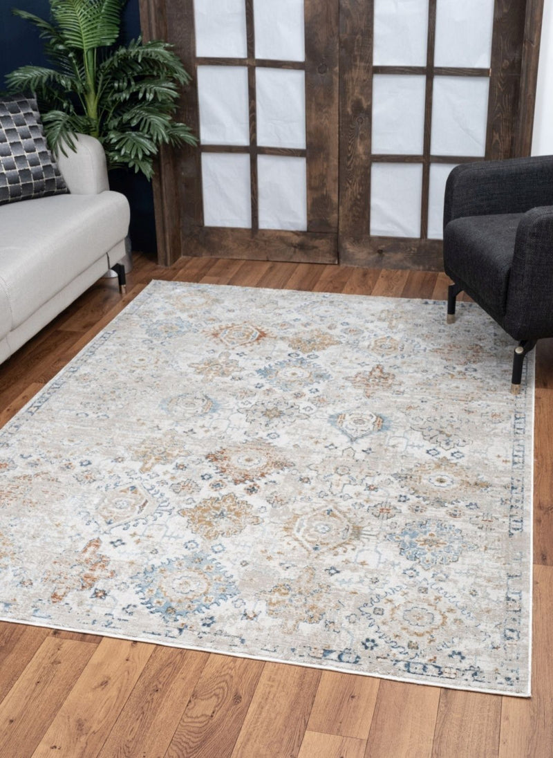 Noble - 5'3" X 7'3" Area Rug Polyester - Ivory - R&R Furniture Gallery (Fountain Valley, CA)