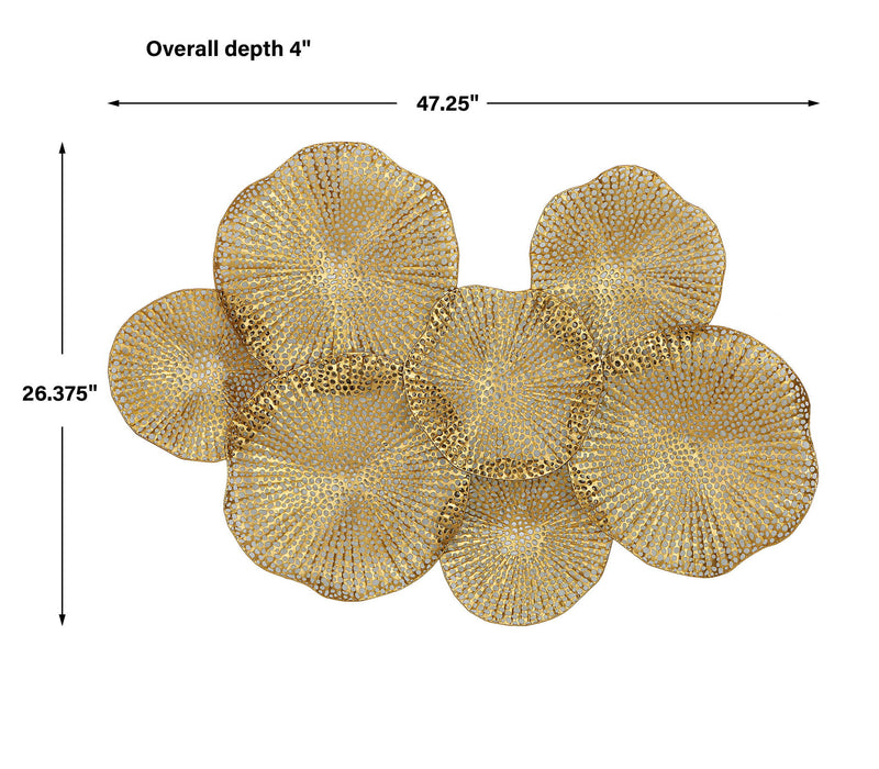 Uttermost Ripley metal wall art decor featuring intricate geometric patterns on a sleek wall surface.