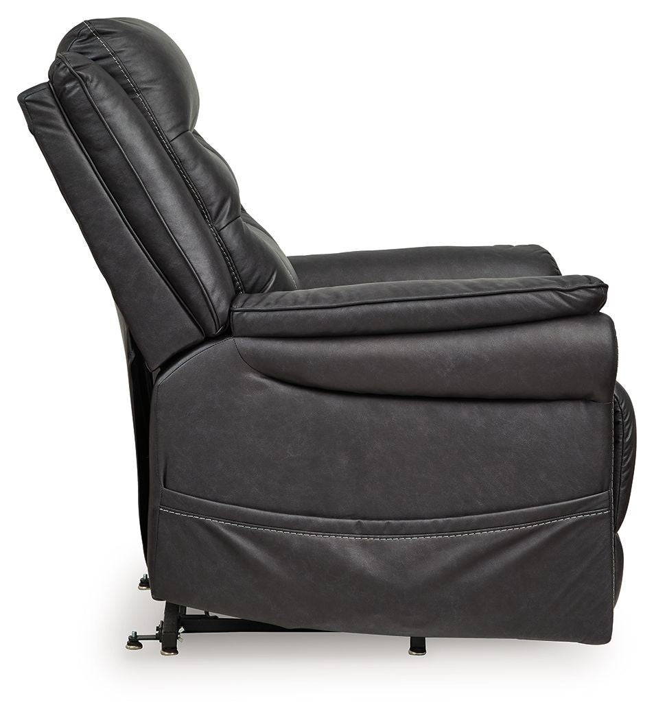 Signature Design by Ashley Oatman power lift recliner in beige fabric with padded armrests and plush cushioning.