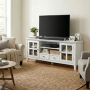 Simpli-Home Acadian TV media stand with open shelves and storage compartments, made of wood in a modern design.