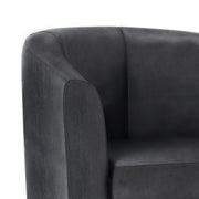Handcrafted Austin arm chair by Simpli-Home with cushioned fabric upholstery and wooden legs, designed for comfortable seating.
