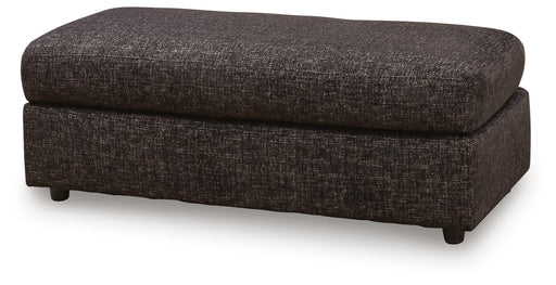 Black oversized accent ottoman from Signature Design by Ashley, featuring a plush fabric surface and modern design.