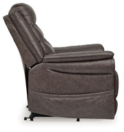 Signature Design by Ashley Oatman power lift recliner in plush fabric with padded armrests and built-in lift mechanism.