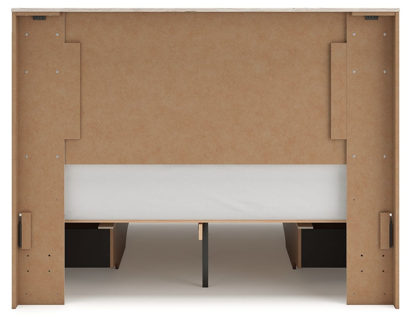 Signature Design by Ashley Lawroy panel bed with built-in storage drawers in a modern bedroom setup.