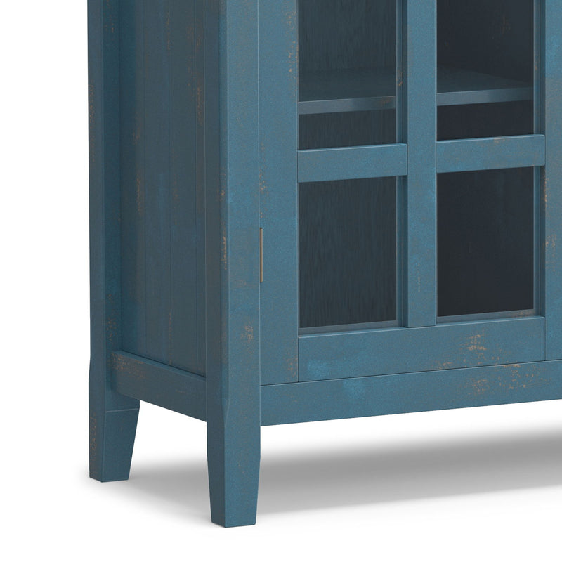 Handcrafted Acadian medium storage cabinet by Simpli-Home, featuring a rustic accent cabinet design with wood finish and storage space.