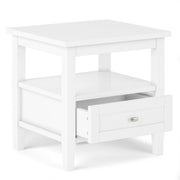 Handcrafted Warm Shaker coffee table by Simpli-Home featuring a wooden tabletop and sturdy legs in a warm finish.