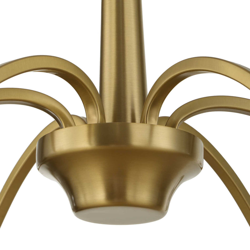 Uttermost Barcelona 6-light brass chandelier with gold finish, featuring elegant curved arms and modern design.