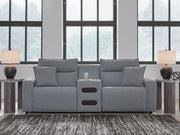 Signature Design by Ashley Modmax II reclining sectional in salt and pepper fabric, showing plush cushions and reclining features.