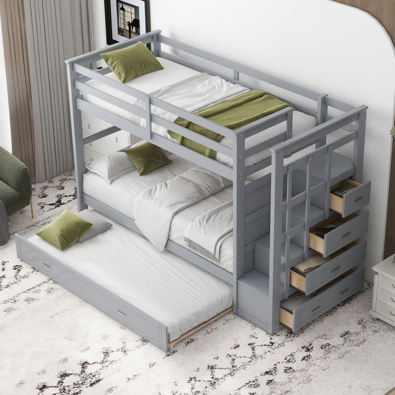 DreamHaus bunk bed with trundle and staircase, featuring sturdy wood construction and space-saving design for children's bedroom.